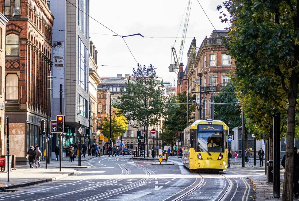 A Metrolink tram on Princess Street in Manchester city centre